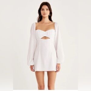 RUMER sold @ Revolve/ Camille cut out balloon Sleeves mini white dress.